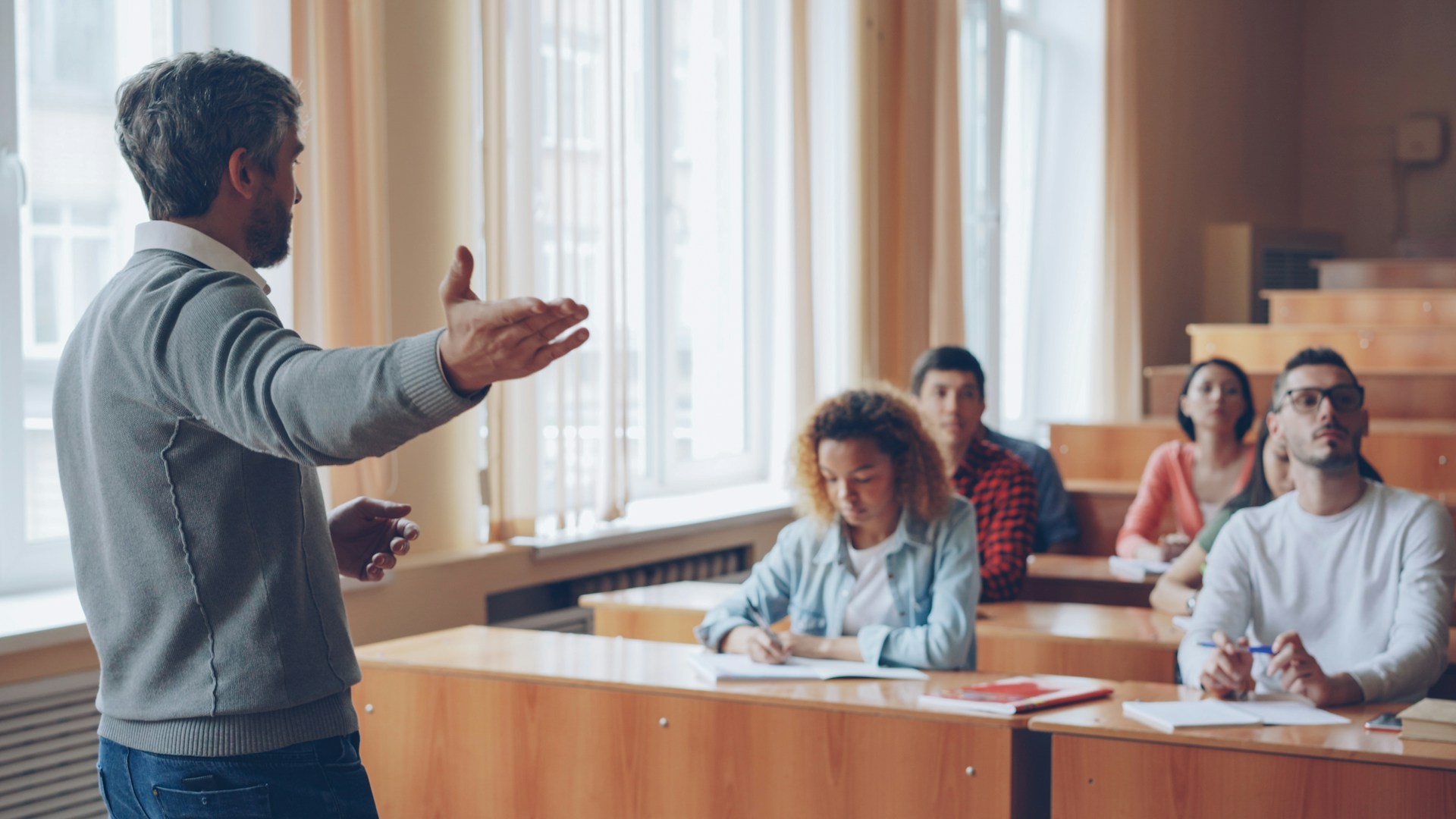 Lecturer explaining to students